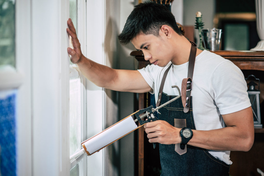 Man fixing and maintaining home
