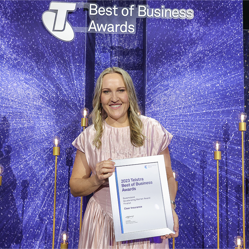 Lisa Carter receiving framed certificate at Telstra Best of Business Awards.