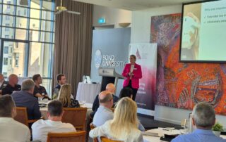 Lisa Carter presenting insights into the insurance industry at the Gold Coast Leaders Business Forum.