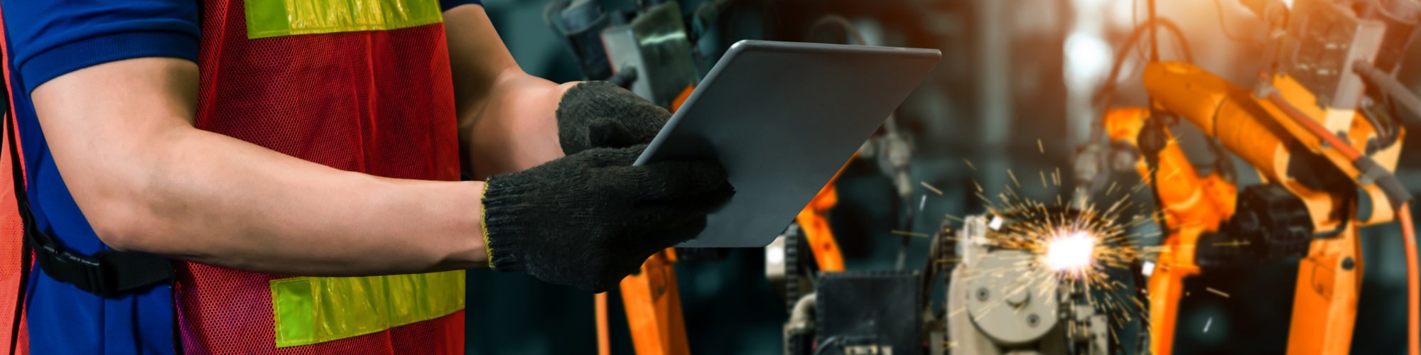 Person operating manufacturing tools and equipment